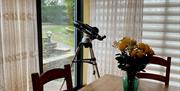 Telescope in the Dining Room at Armidale Cottages Bed & Breakfast in High Seaton, Cumbria