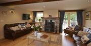 Living Room at Autumn Cottage at Helm Mount Cottages in Barrows Green, Cumbria