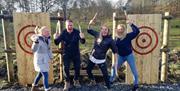 Groups at Archery and Axe Throwing with Graythwaite Adventure near Hawkshead, Lake District