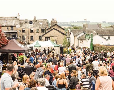 Photo of a Crowd in Kendal, Cumbria - Promoting Brewery Arts' Summer Sundays 2023 Events, including The Seals