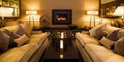 Lounge and Fireplace at The Gilpin Hotel & Lake House in Windermere, Lake District