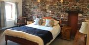 Bedroom at Dickinson Place Holiday Cottages in Allonby, Cumbria