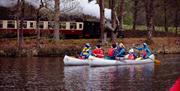 Visitors Enjoying Accessible Canoeing at Bendrigg Trust in the Lake District, Cumbria
