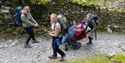 Visitors Enjoying Accessible Walks at Bendrigg Trust in the Lake District, Cumbria