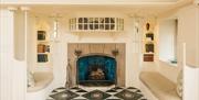 Sitting area and fireplace at Blackwell, The Arts & Crafts House in Bowness-on-Windermere, Lake District