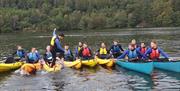 Group Canoeing with Graythwaite Adventure near Hawkshead, Lake District