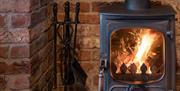 Cosy Log Burner at The Tranquil Otter in Thurstonfield, Cumbria