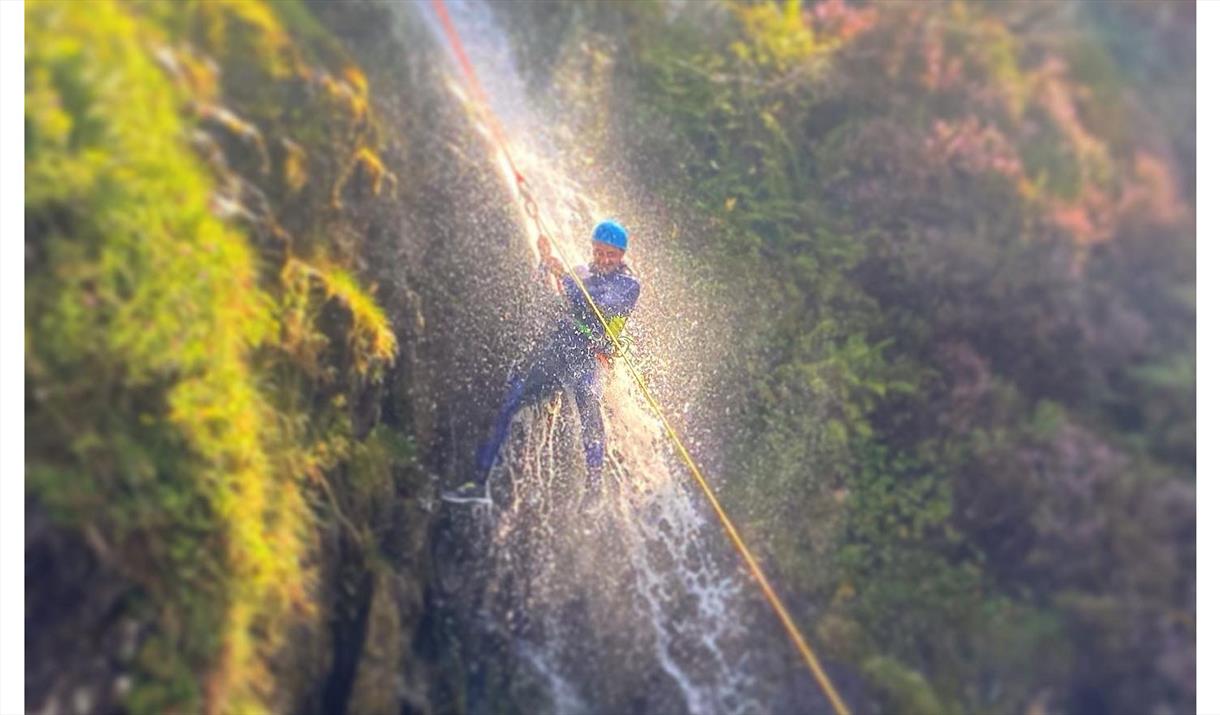Visitor Canyoning at Devi's Canyon with Crags Adventures in the Lake District, Cumbria