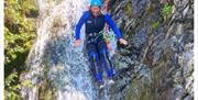 Visitor Scrambling and Canyoning with Crags Adventures in the Lake District, Cumbria