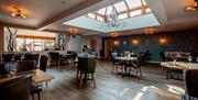 Dining Area and Skylight at The Restaurant at Crooklands Hotel in Milnthorpe, Cumbria