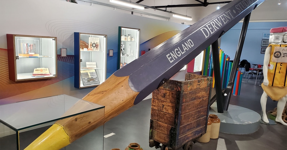 The image shows one of the largest colour pencils in the world measuring almost 8 meters!