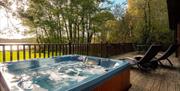 Hot Tub at Dunnock Lodge at The Tranquil Otter in Thurstonfield, Cumbria