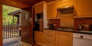 Kitchen at Fieldfare Lodge at The Tranquil Otter in Thurstonfield, Cumbria