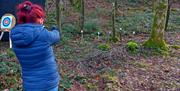 Visitor Practicing Shooting with Green Man Survival in Newby Bridge, Lake District