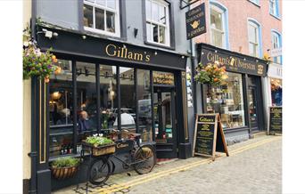 Exterior and Flowers at Gillam's Tearoom in Ulverston, Cumbria