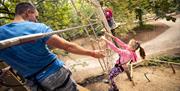Family on a Treetop Challenge at Go Ape in Whinlatter Forest Park in Braithwaite, Lake District