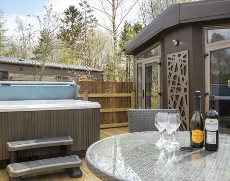Hot Tubs with Lodges at Flusco Wood Holiday Lodges in Cumbria
