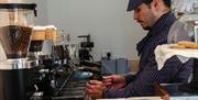 Staff Member Making Coffees at Grasmere Gingerbread® in Hawkshead, Lake District
