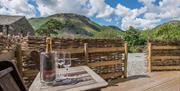 Enjoy a glass of wine at Grasmere Glamping on Broadrayne Farm, Lake District