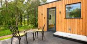Outdoor Seating and Hot Tub at Brow Wood Cabin on the Hutton John Estate in the Lake District, Cumbria
