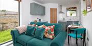 Lounge and Kitchen at Brow Wood Cabin on the Hutton John Estate in the Lake District, Cumbria