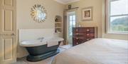 Standalone Bathtub and Wardrobe in Suite Four at Haven Cottage in Ambleside, Lake District