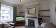 Lounge with Wood Burner at Heather View in Threlkeld, Lake District