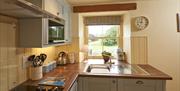 Kitchen at Helm Mount Lodge & Cottages in Barrows Green, Cumbria