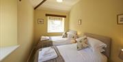 Twin Bedroom at Helm Mount Lodge & Cottages in Barrows Green, Cumbria