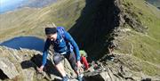 Exhilarating Experience up Striding Edge on Helvellyn with Large Outdoors in the Lake District, Cumbria
