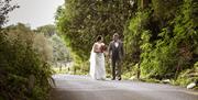 A Couple Celebrating Their Wedding at Lindeth Howe in Bowness-on-Windermere, Lake District