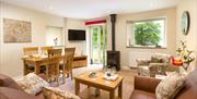 Lounge and dining area at Hill of Oaks Holiday Park in Windermere, Lake District