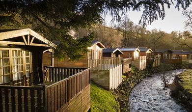 Exterior of Holiday Homes on the Riverbank at Limefitt Holiday Park in Troutbeck, Lake District