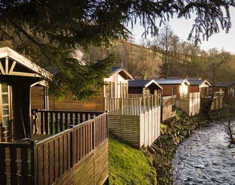 Exterior of Holiday Homes on the Riverbank at Limefitt Holiday Park in Troutbeck, Lake District
