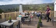 Visitors Dining Outside at Limefitt Holiday Park in Troutbeck, Lake District