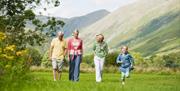 Family Walking near Limefitt Holiday Park in Troutbeck, Lake District