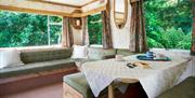 Dining and seating area in Retro Caravan in Manesty, Lake District