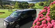 Minibus with a Scenic Lake District Background, from Lakeside Travel Services in the Lake District, Cumbria