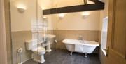 Bathroom with Claw Foot Tub and Shower at Netherby Hall in Longtown, Cumbria