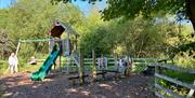 Children's playground at Newby Bridge Country Caravan Park in Newby Bridge, Lake District