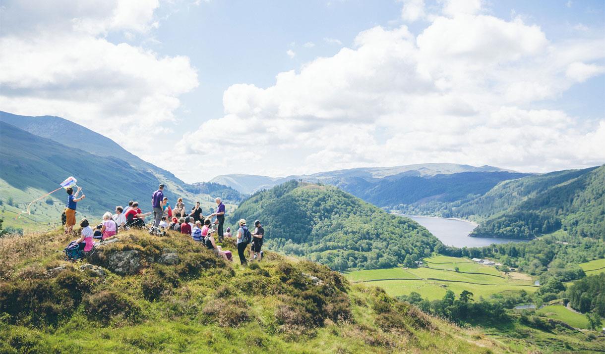 Visitors on the Orrest Head National Park Guided Walk in the Lake District, Cumbria