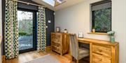 Office Desk and Entryway at Moor View Cottage at Park Cliffe Camping & Caravan Estate near Windermere, Lake District