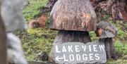 Sign reading 'Lakeview Lodges' with a Red Squirrel beside it at The Estate in Glenridding, Lake District