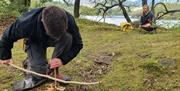 Visitor on a Bushcraft Experience with Path to Adventure in the Lake District, Cumbria