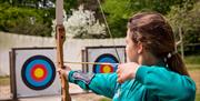 Visitor on an Archery Experience with Path to Adventure in the Lake District, Cumbria