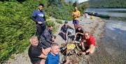 Visitors on a Canoe and Bushcraft Experience with Path to Adventure in the Lake District, Cumbria