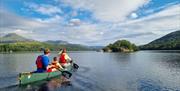 Visitors on a Guided Canoe Trip with Path to Adventure in Coniston, Lake District