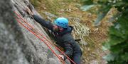 Visitor Rock Climbing with Path to Adventure in the Lake District, Cumbria