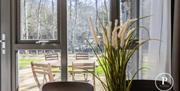 Dining Room with View of Outdoor Seating at Primero Apartments in Backbarrow, Lake District