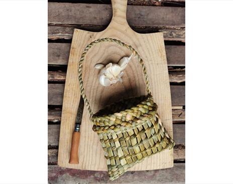 Rush Garlic Basket, made with Rachel Frost at Quirky Workshops at Greystoke Craft Garden & Barns in Greystoke, Cumbria